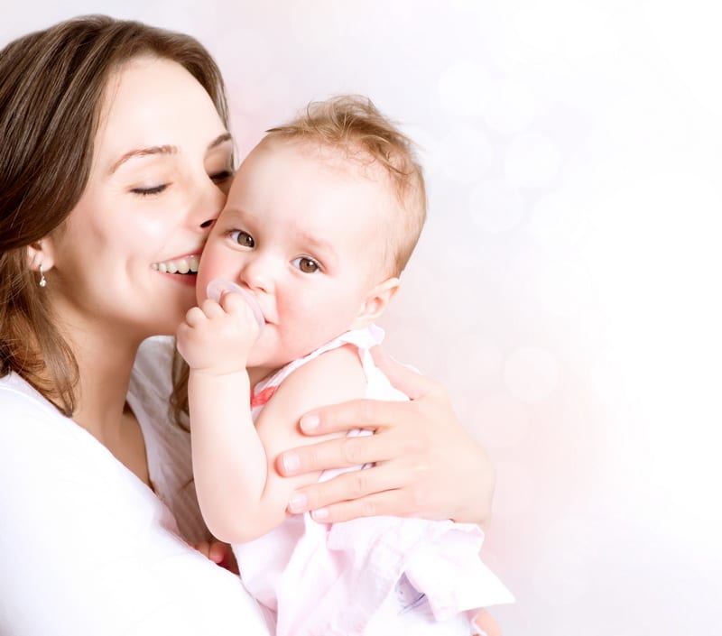 Bigstock Mother And Baby Kissing And Hu 44698546