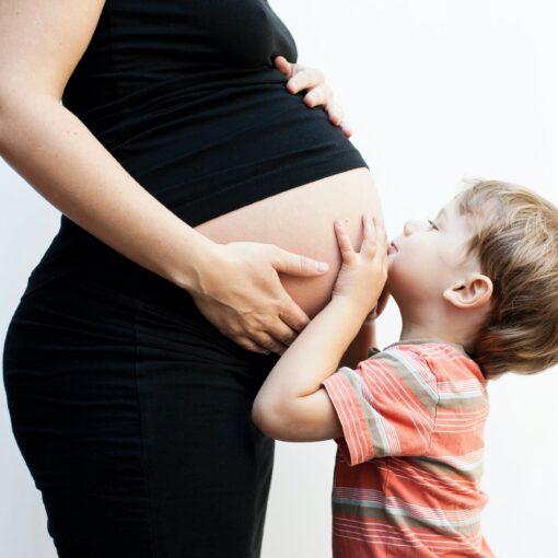 Boy With Pregnant Mother