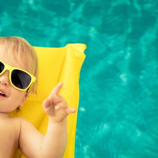 Funny Baby Boy In Swimming Pool