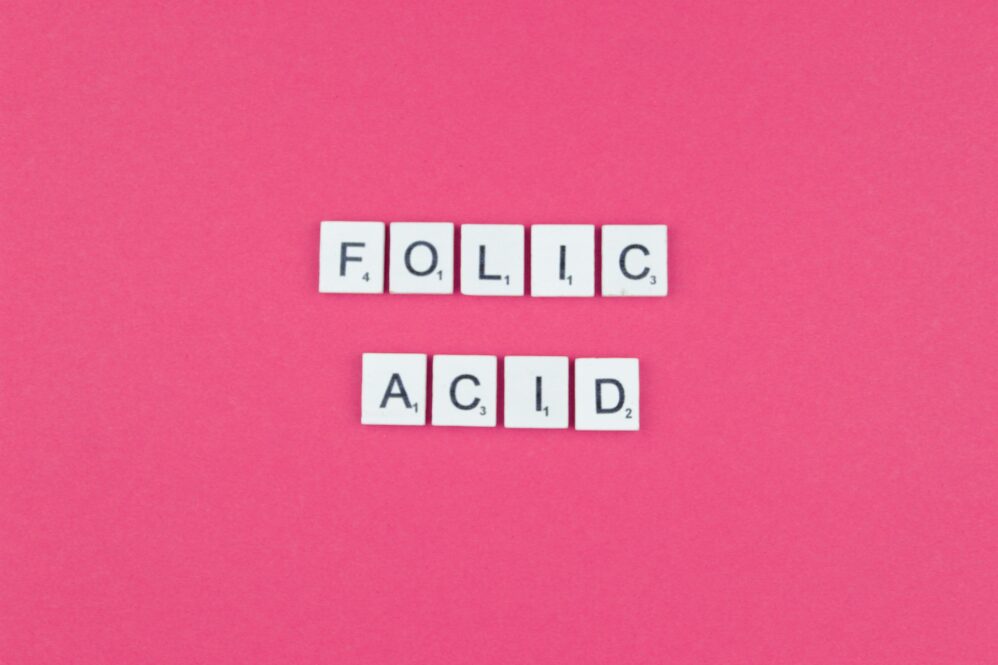 Folic Acid Scrabble Letters Word On A Pink Background